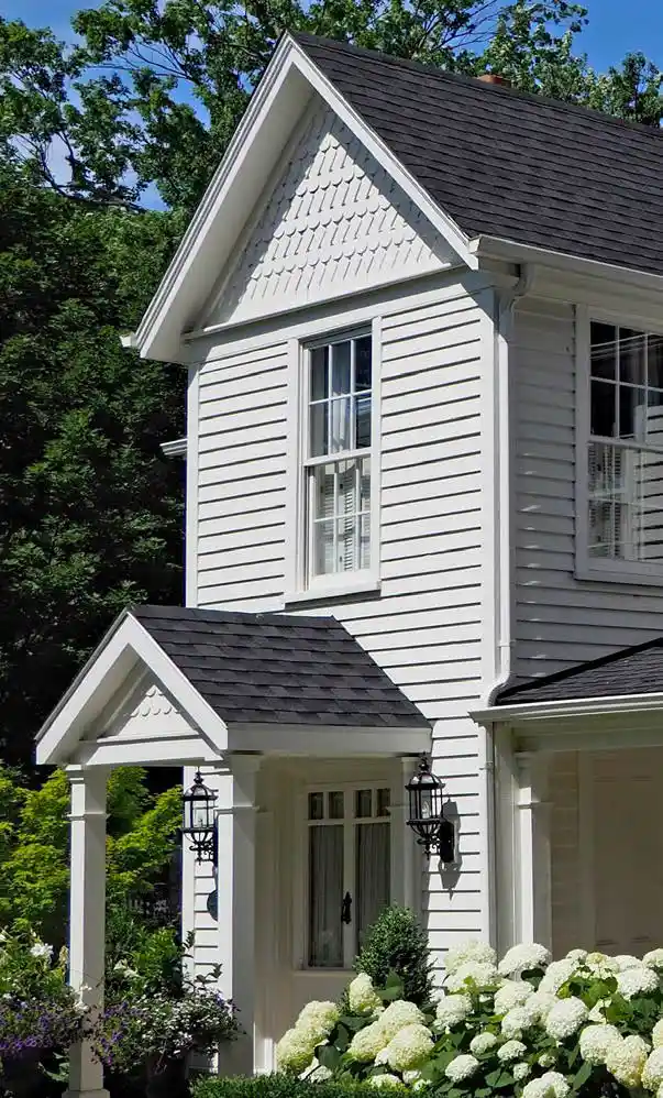 The exterior of a remodeled home in modern Victorian style.